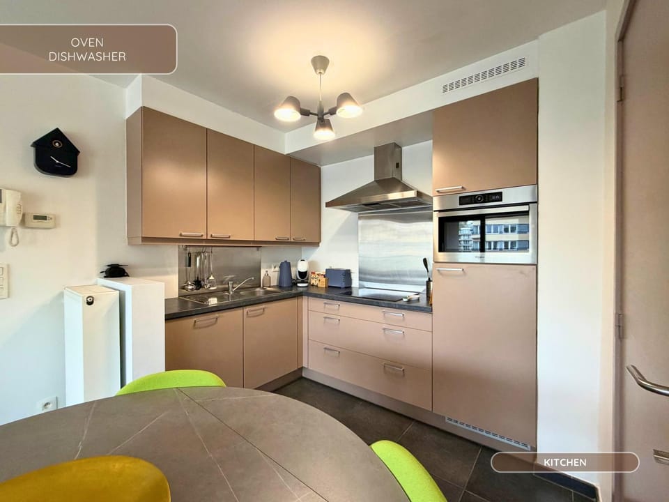 Kitchen or kitchenette, dishwasher, oven, stove