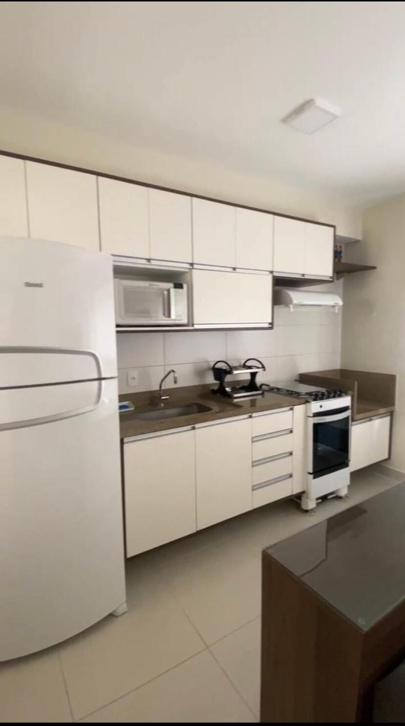 Apartamento resort na Riviera com piscina, lazer completo e perto da praia Apartment in Bertioga