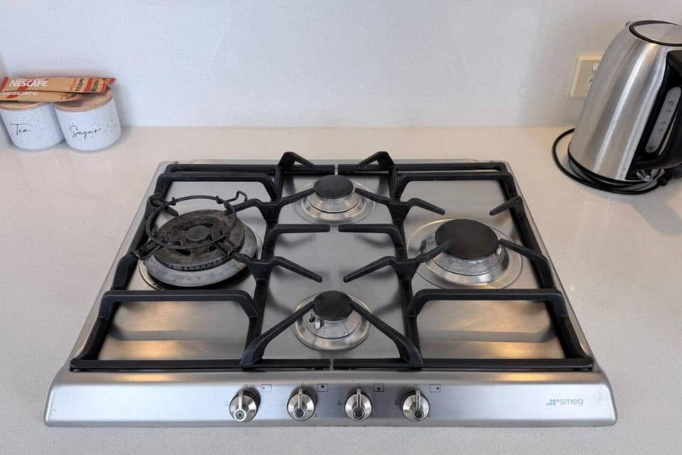 Kitchen or kitchenette, stove