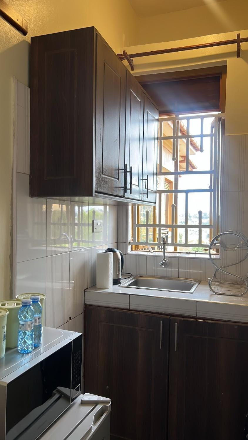 Cozy living by Miranda, Bukoto 1BRM, Un Ltd Wi-Fi Apartment in Kampala
