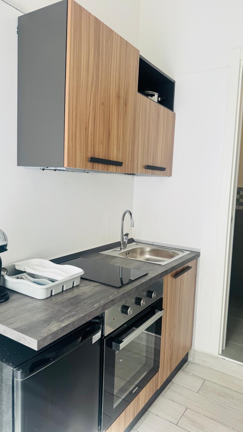 Kitchen or kitchenette, stove