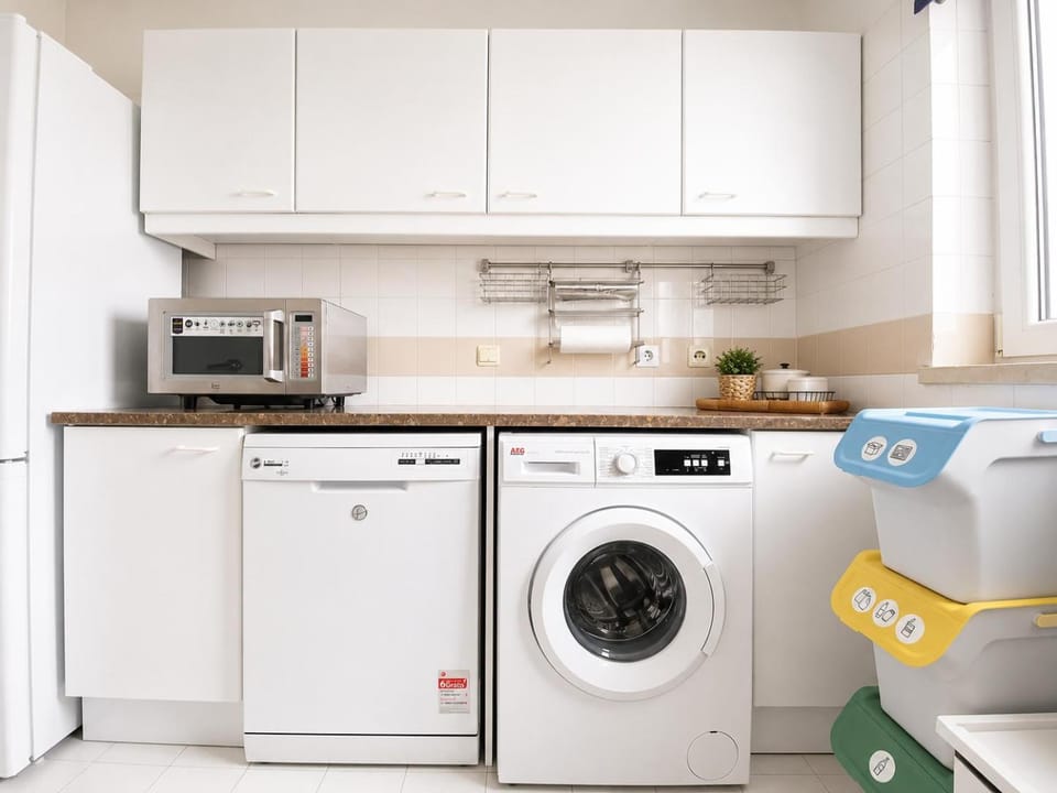 Kitchen or kitchenette, dishwasher, microwave, washing machine