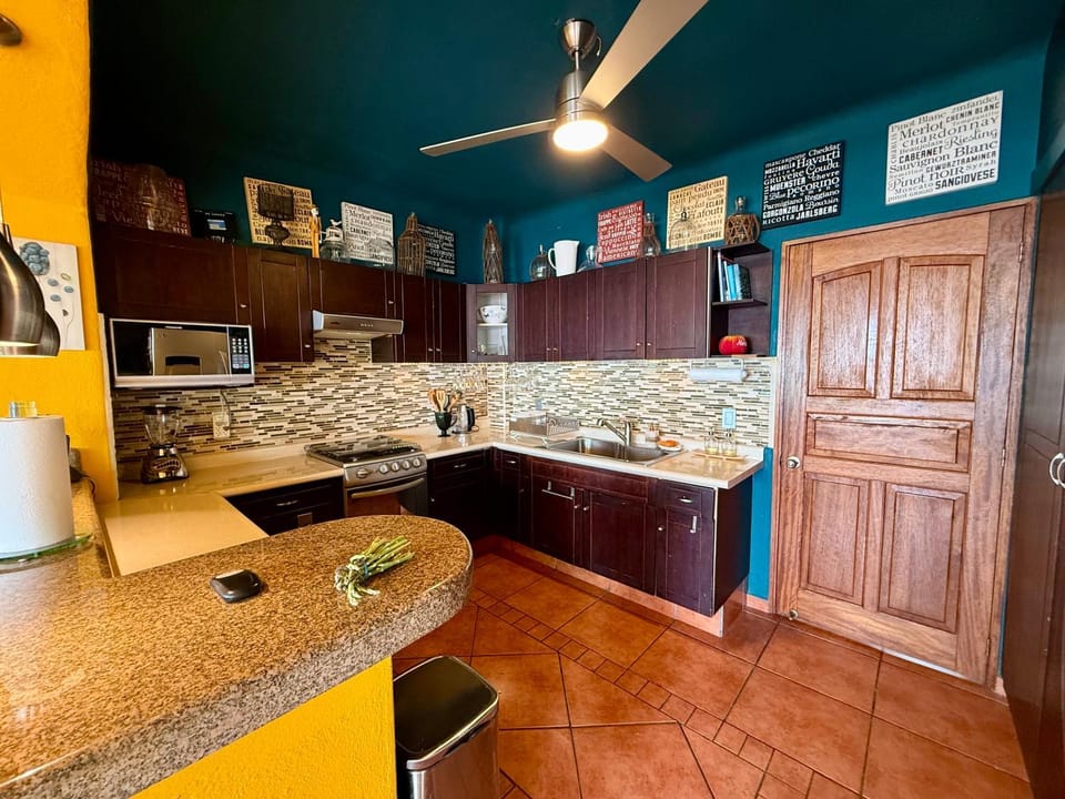 Kitchen or kitchenette, oven, stove