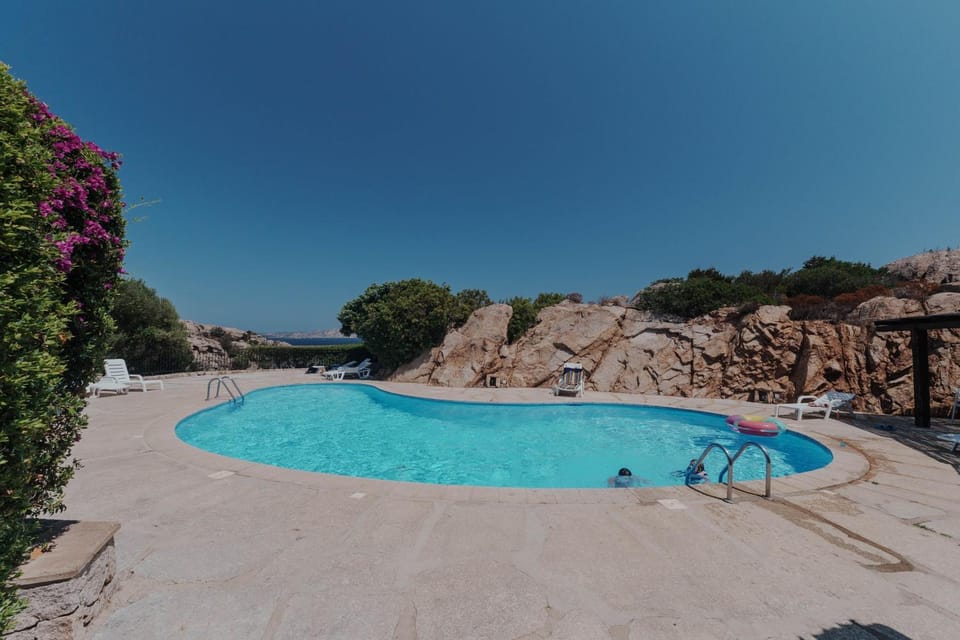 Property building, Living room, Swimming pool