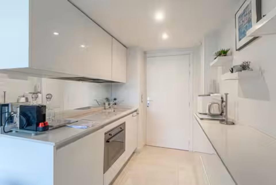 Kitchen or kitchenette, oven, stove, toaster