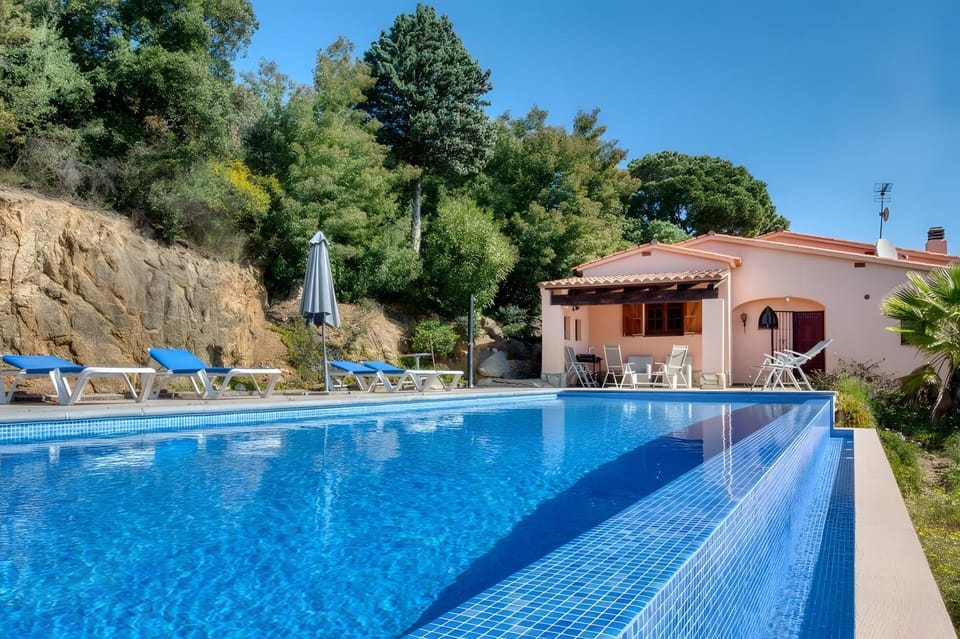 Property building, Living room, Swimming pool