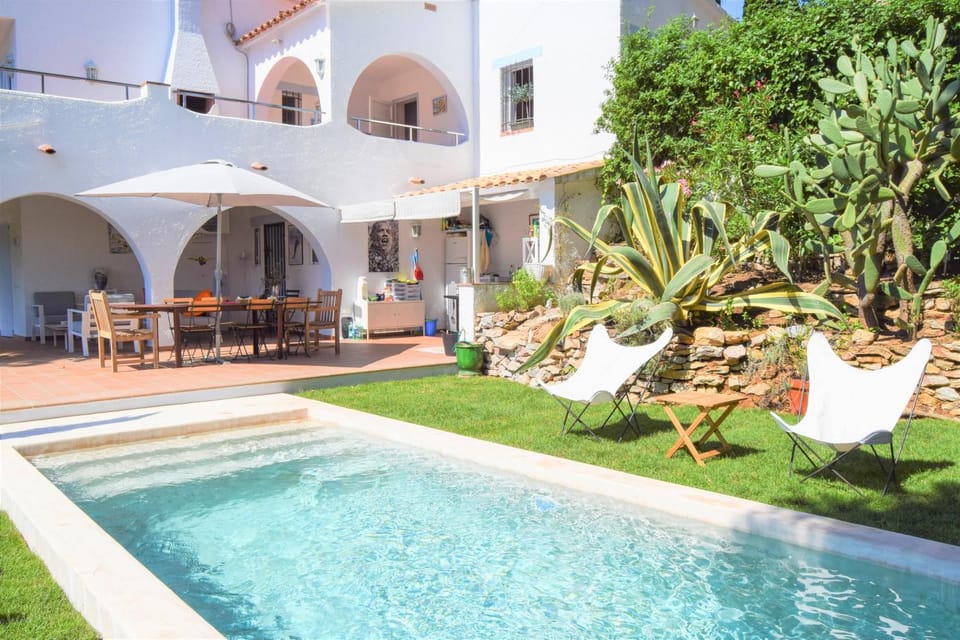 Property building, Living room, Swimming pool
