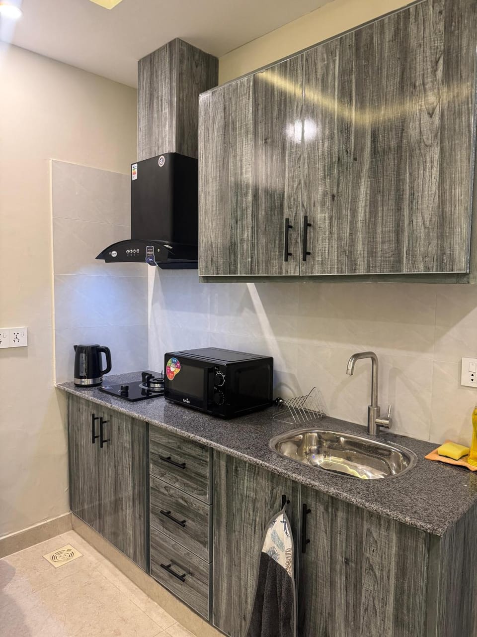 Kitchen or kitchenette, microwave