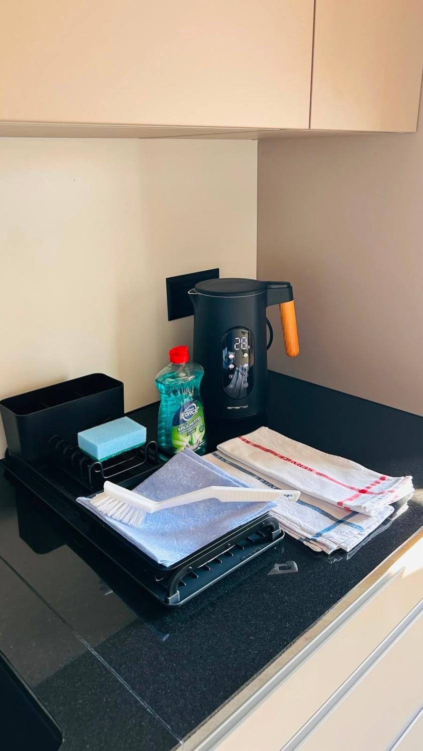 Kitchen or kitchenette, dishwasher, stove, toaster