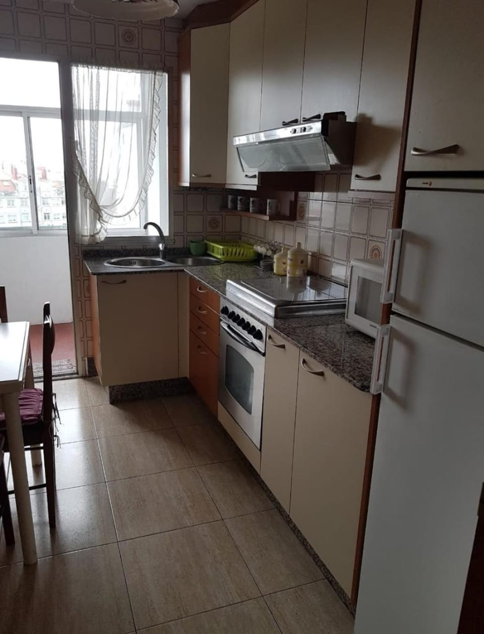 Kitchen or kitchenette, oven, stove, toaster