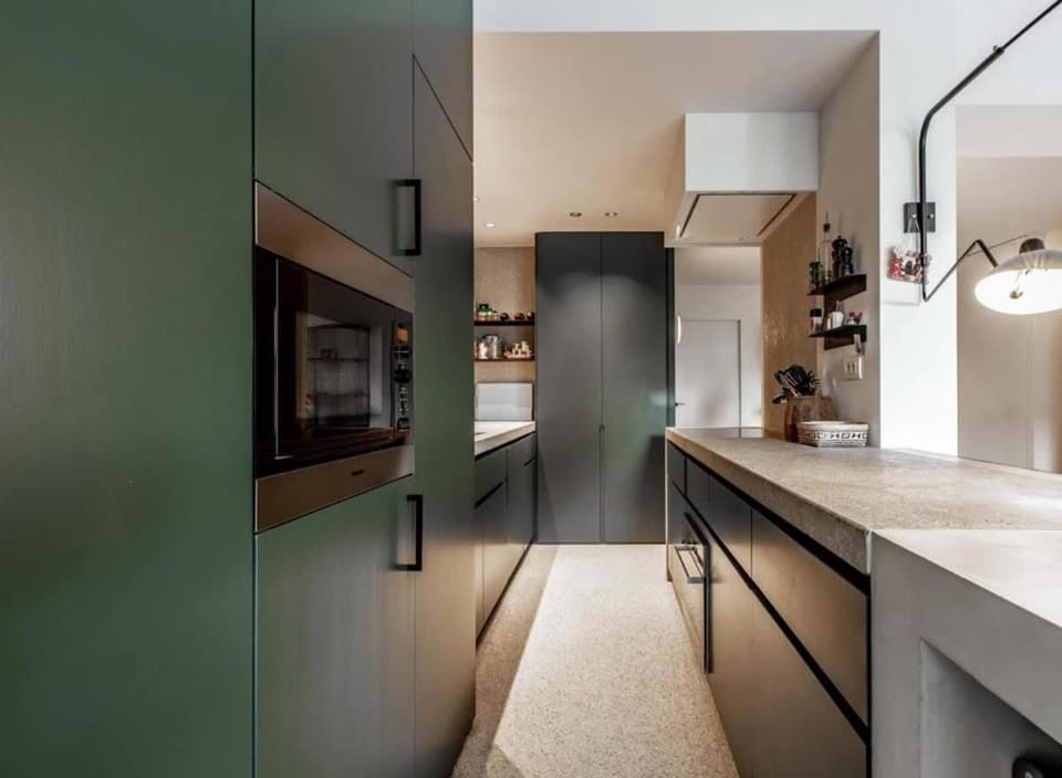 Kitchen or kitchenette, dishwasher, oven, stove