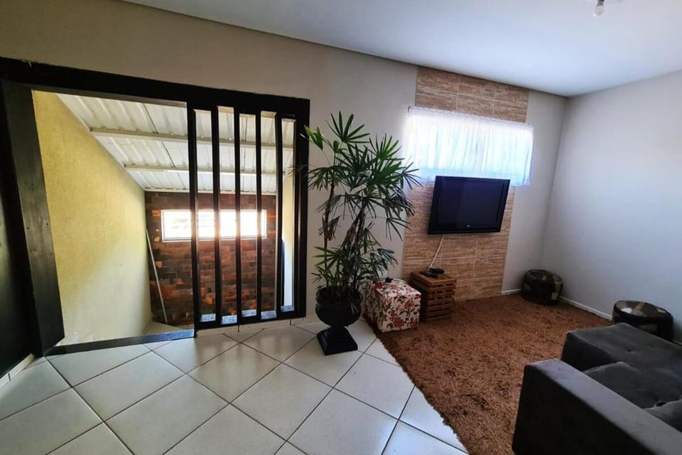 Refúgio Amplo e Central - 200m para sua tribo Apartment in Cascavel
