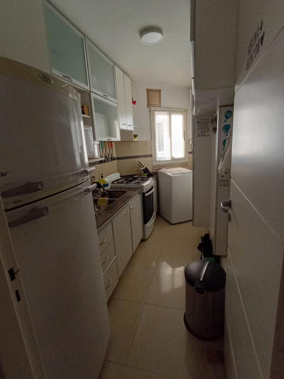 Kitchen or kitchenette, washing machine