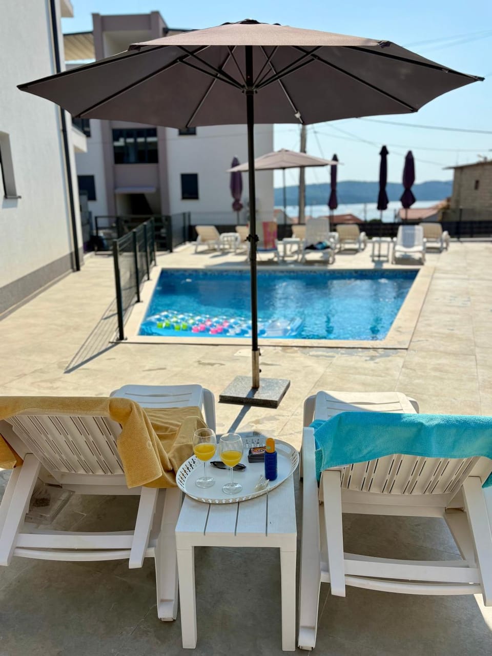 Swimming pool, sunbed