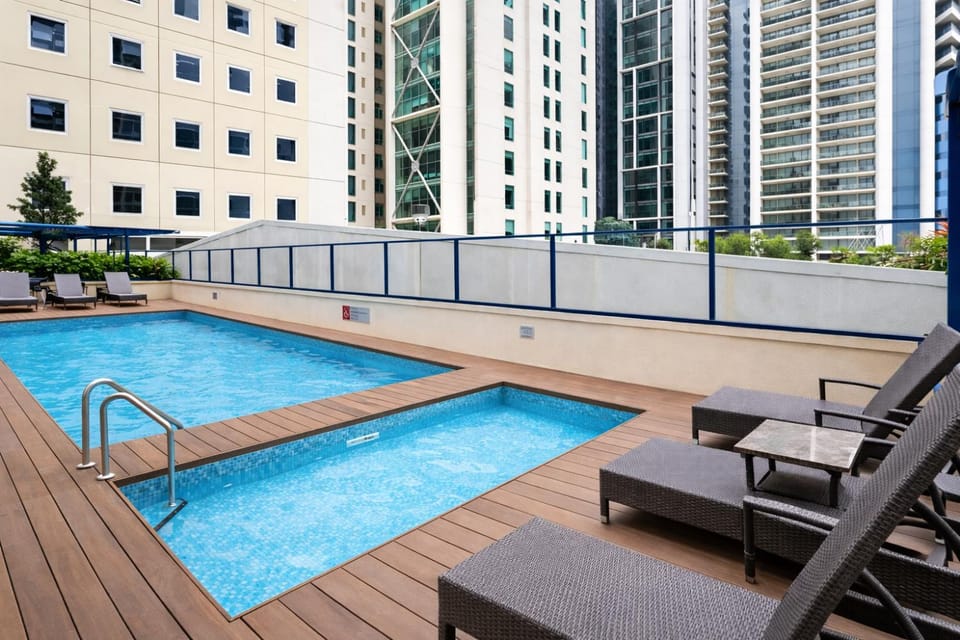 Property building, Day, Pool view, Swimming pool