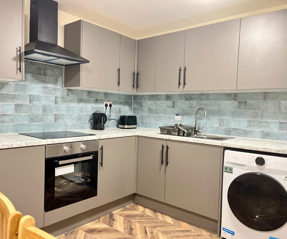 Communal kitchen, oven, stove, toaster, washing machine, dryer