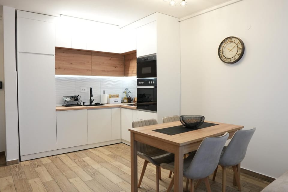 Dining area, dishwasher, microwave, oven, kitchen