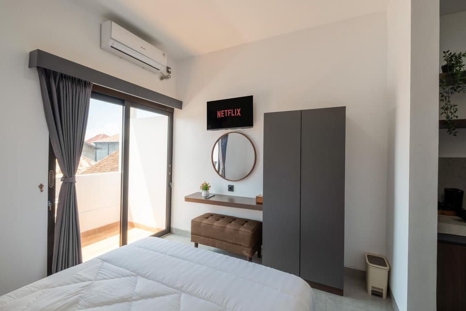 Bed, wardrobe, air conditioner