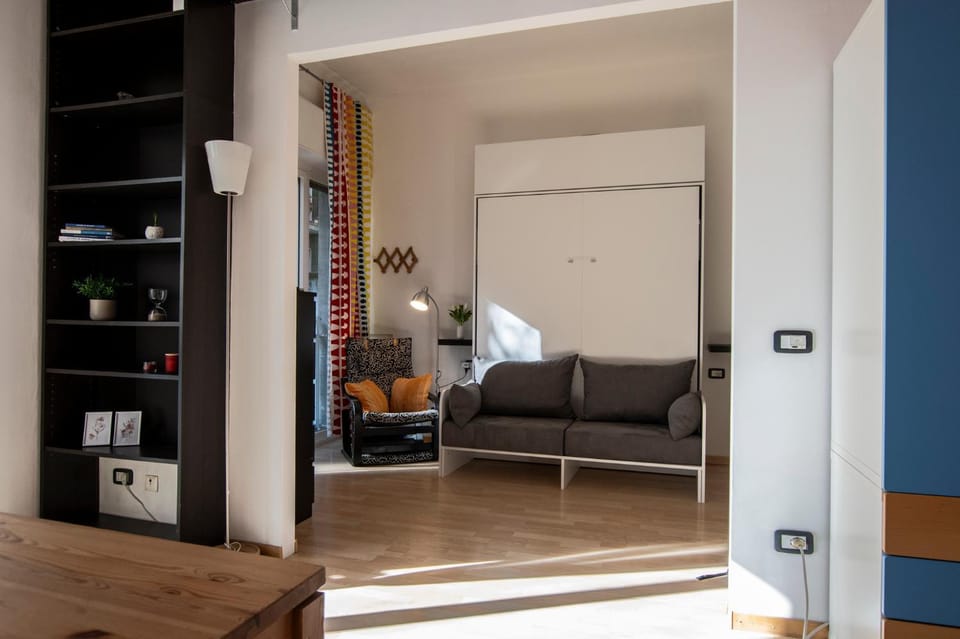Bed, Living room, Seating area, Bedroom