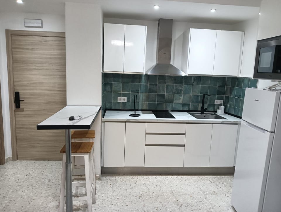 Kitchen or kitchenette, stove