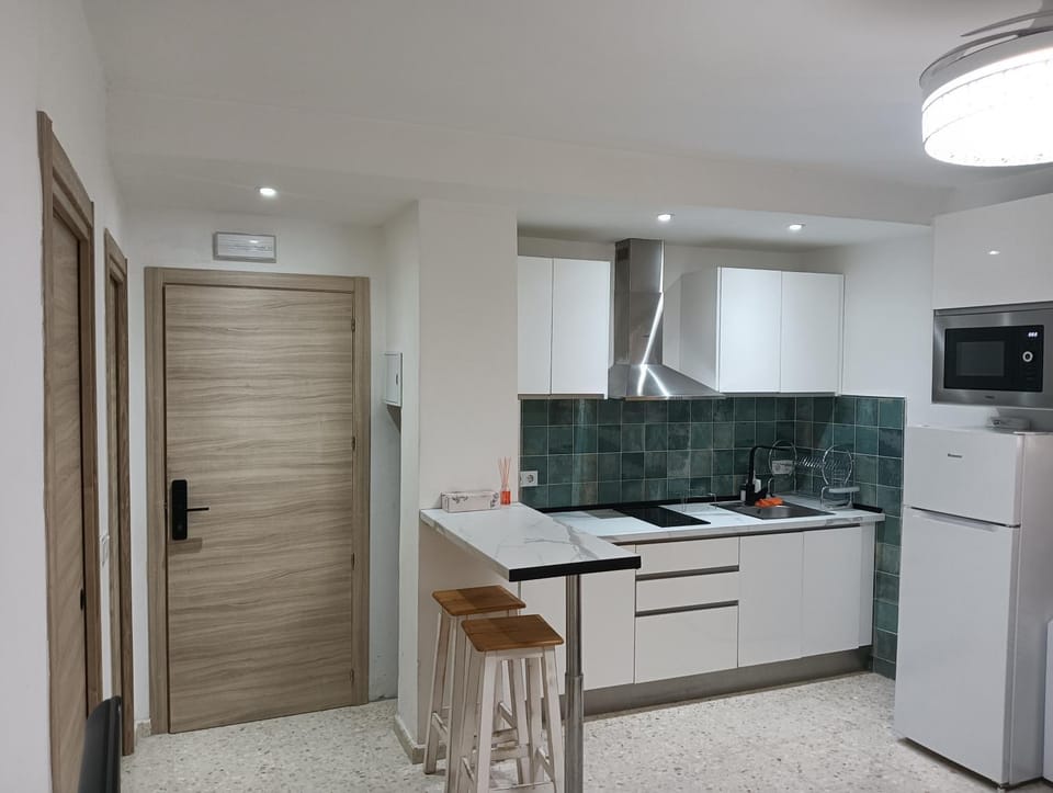 Kitchen or kitchenette, stove