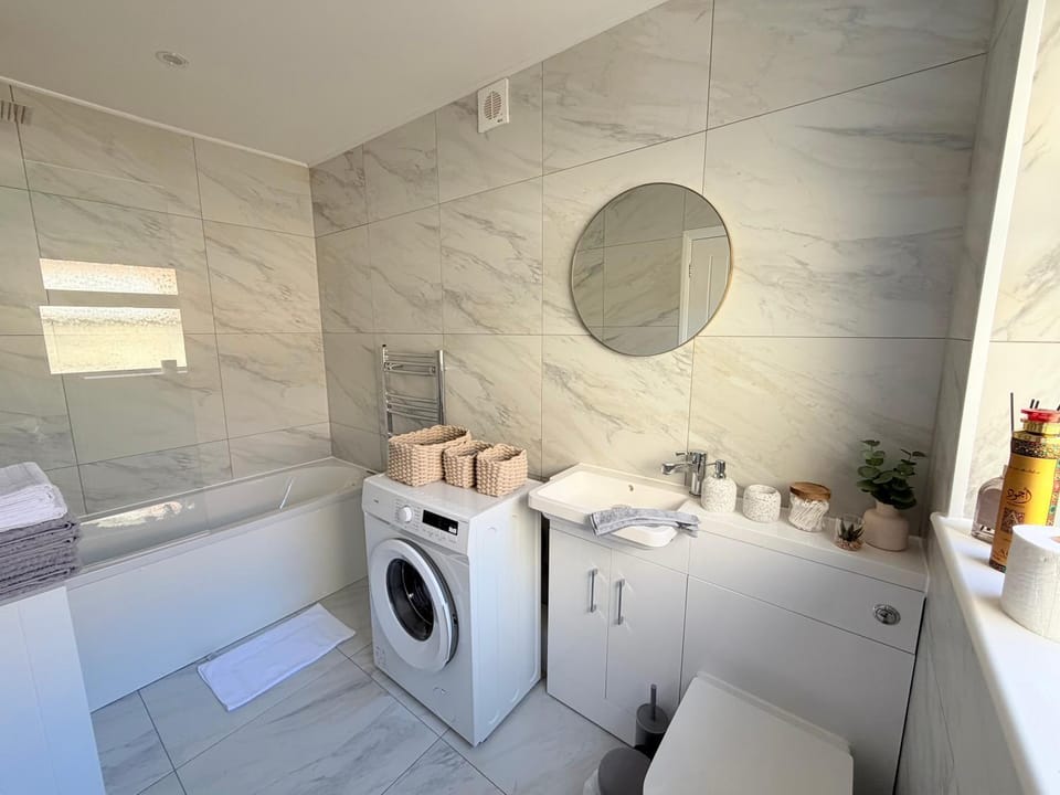 Bathroom, towels, washing machine, dryer