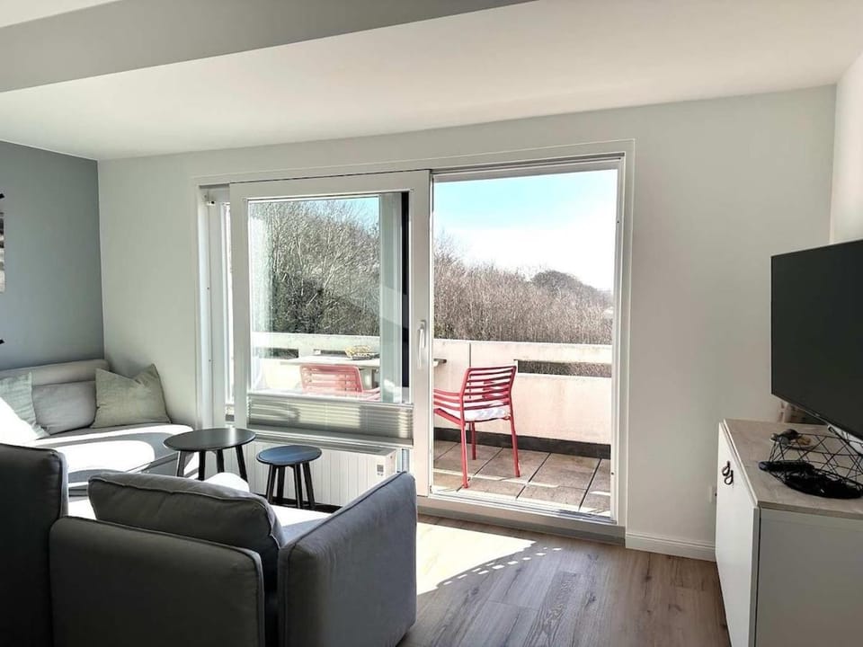 Sky & Sand Homes Weitblick I Helle Galeriewohnung mit atemberaubendem Meerblick, erste Strandlage, Skandi-Design, sonniger Balkon Apartment in Sankt Peter-Ording