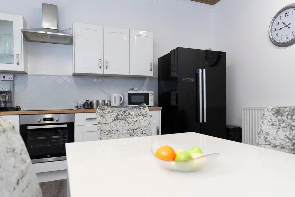 Kitchen or kitchenette, oven, stove, toaster