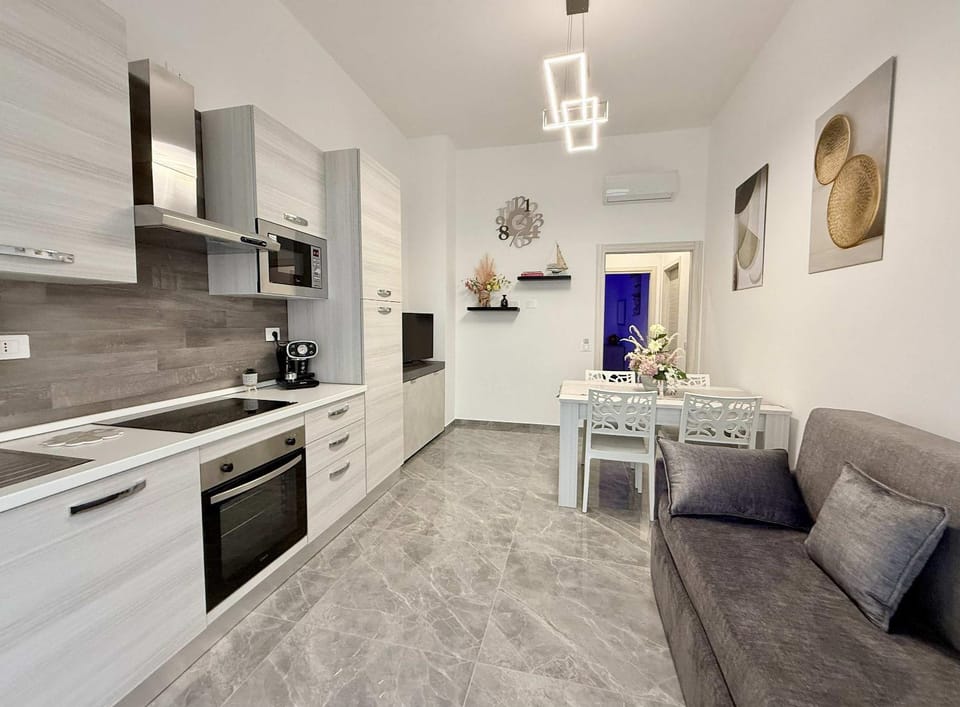 Kitchen or kitchenette, Living room, Dining area, dishwasher, oven, stove