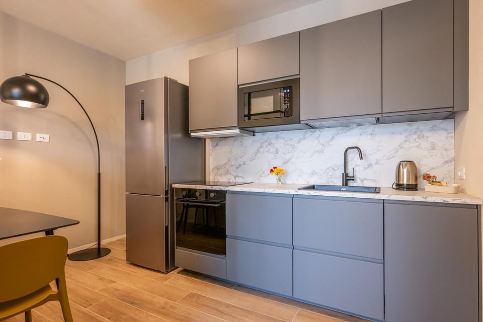 Kitchen or kitchenette, oven, stove
