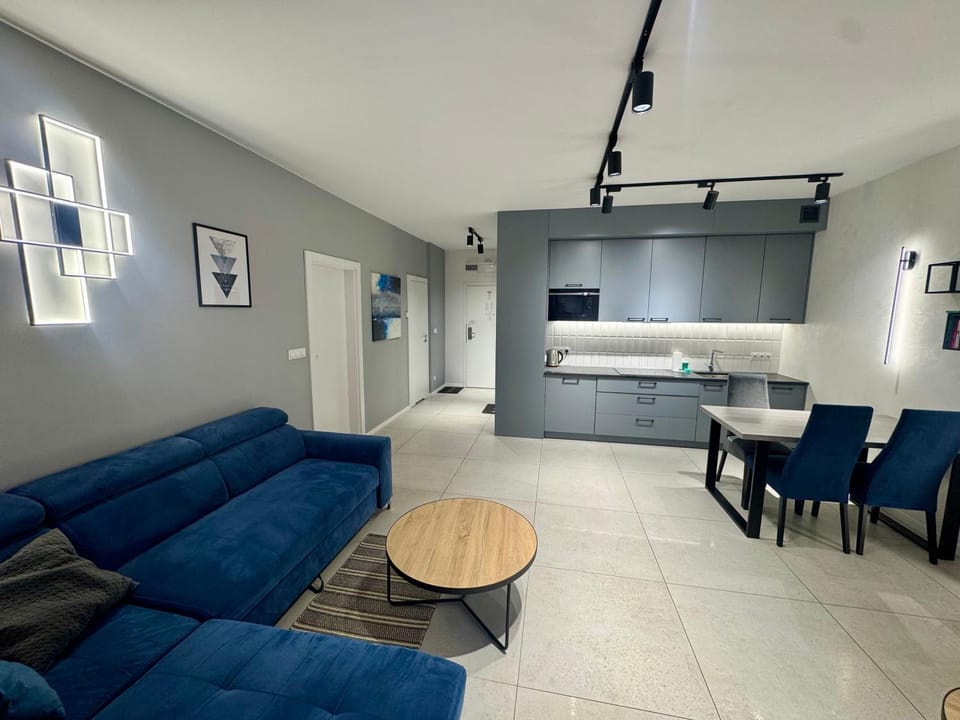 Bed, Kitchen or kitchenette, Seating area