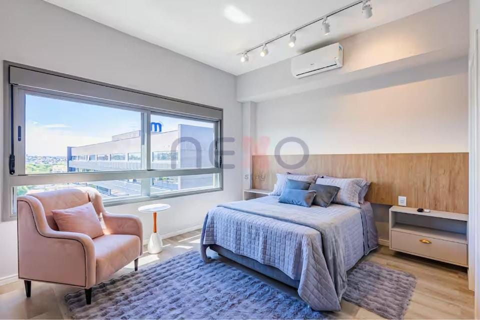 Bed, Living room, Seating area, Bedroom, air conditioner