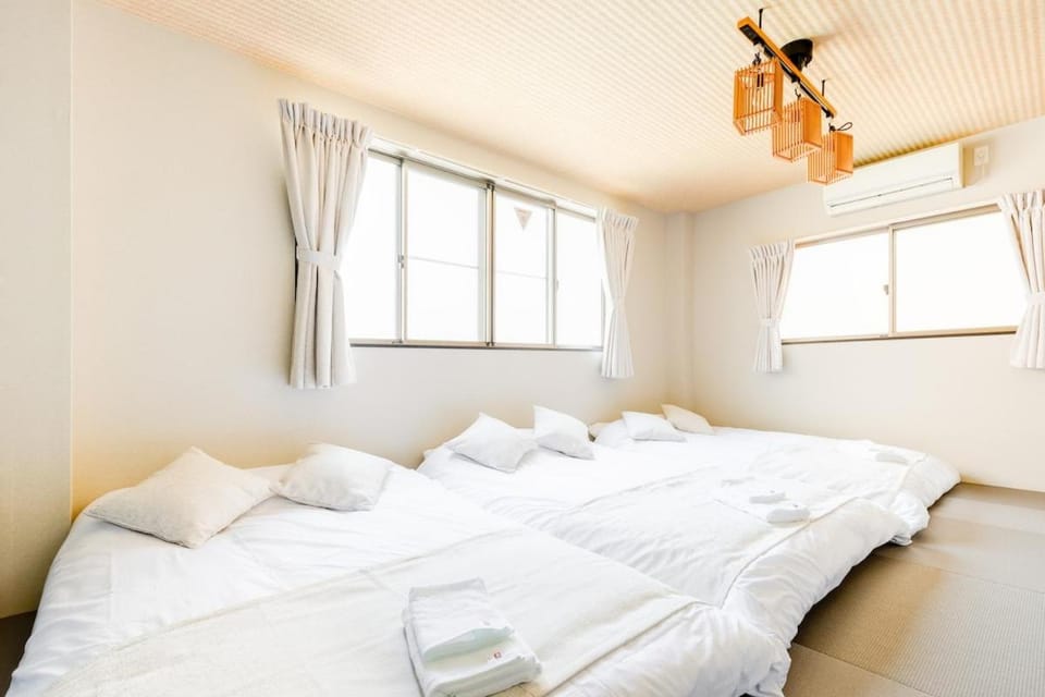 USJまで車で15分 戸建て貸切 寝室2部屋 ベッド6台 最大12名利用a Villa in Osaka