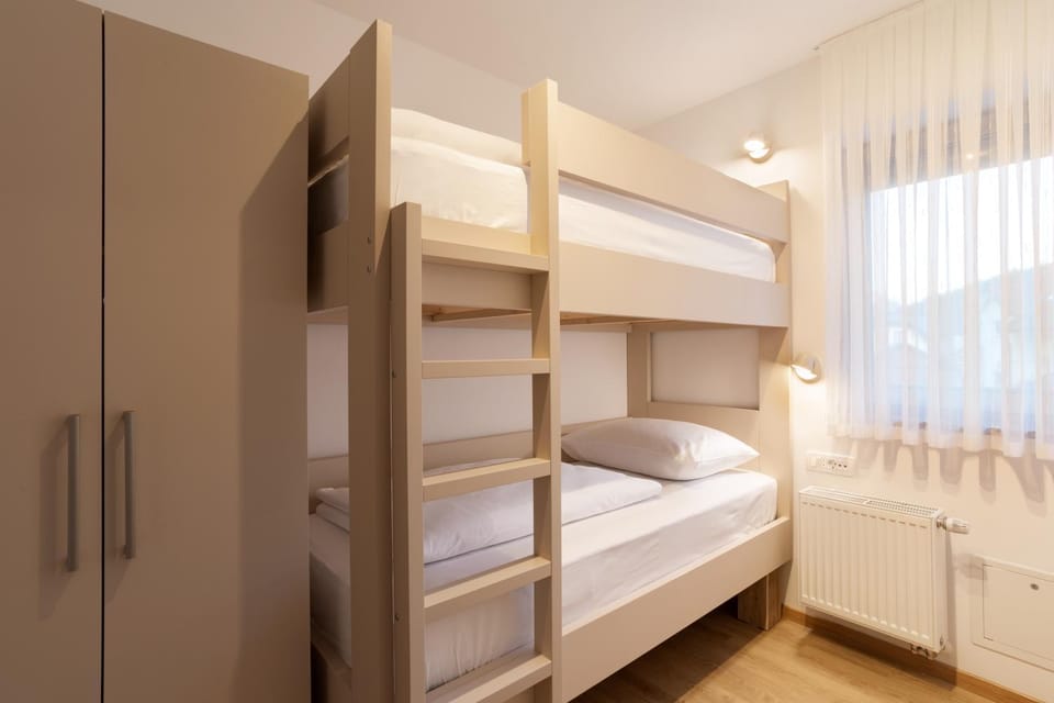 Bed, Photo of the whole room, Bedroom, bunk bed, towels, wardrobe