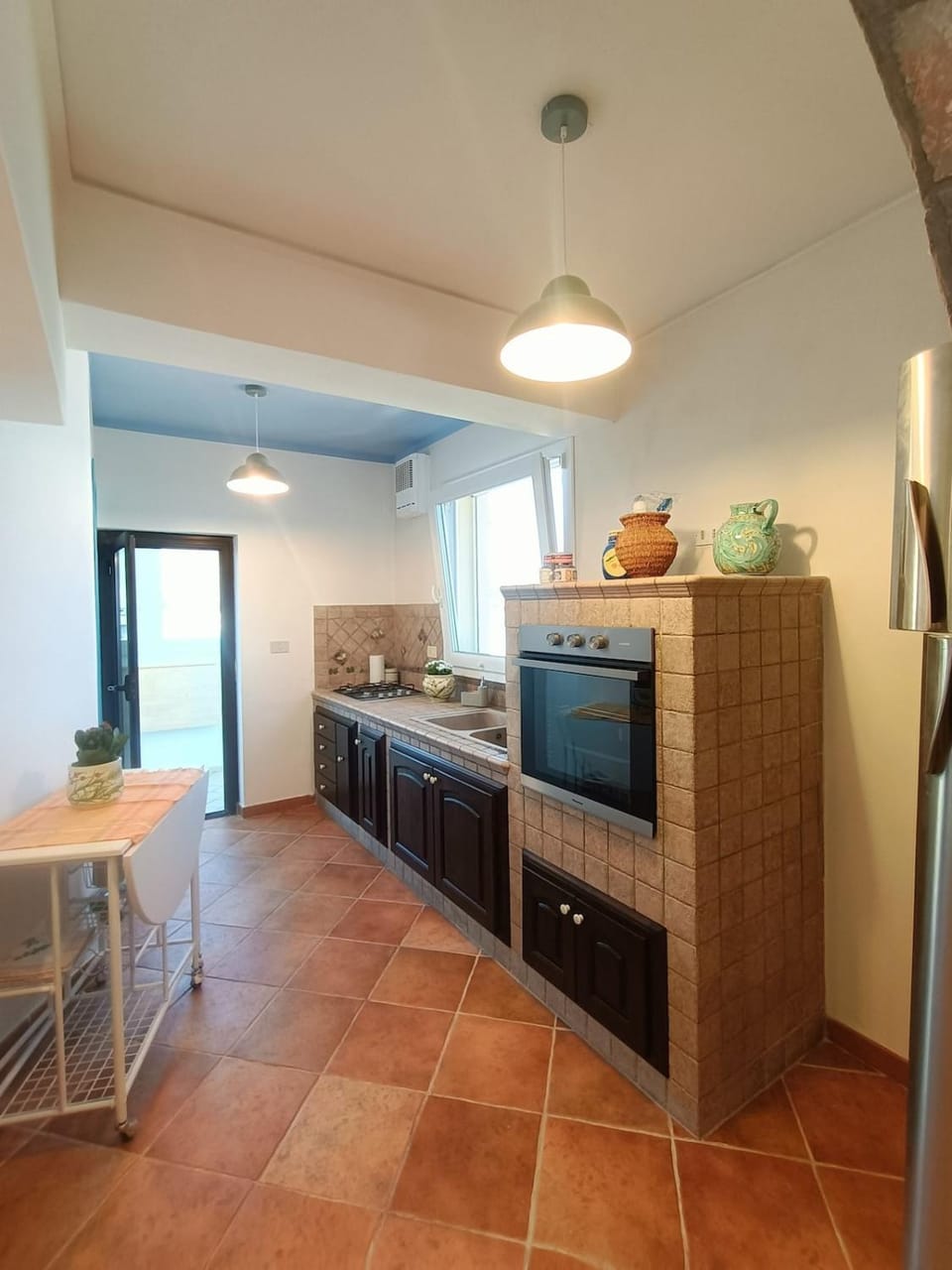 Kitchen or kitchenette, oven, stove