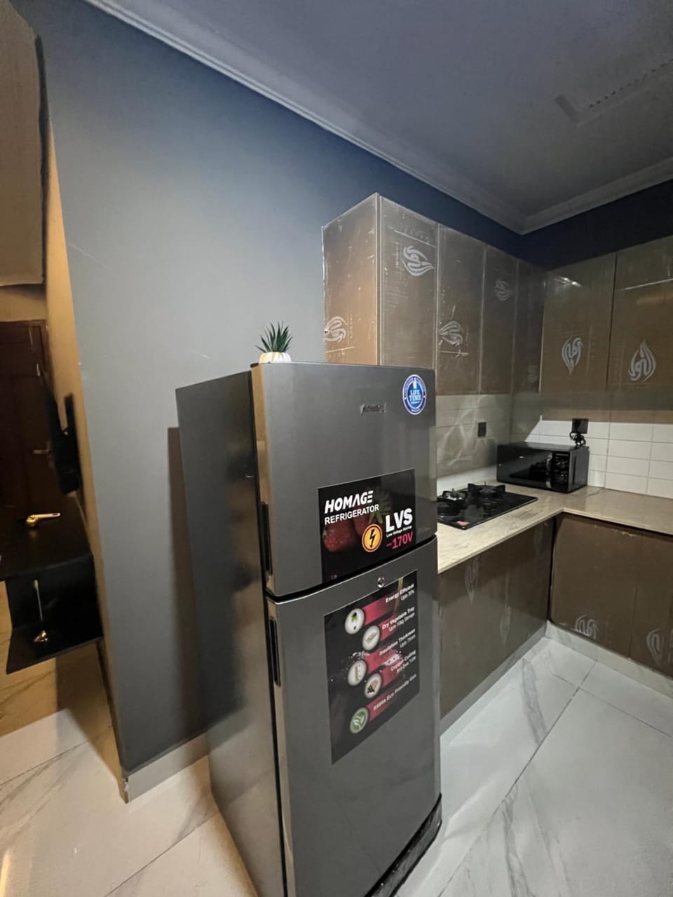 2BR Chic Charcoal & Chocolate Designer Apartment Apartment in Lahore
