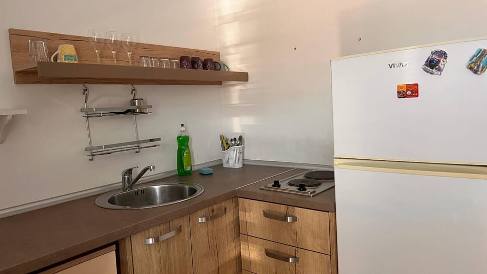 Kitchen or kitchenette, stove