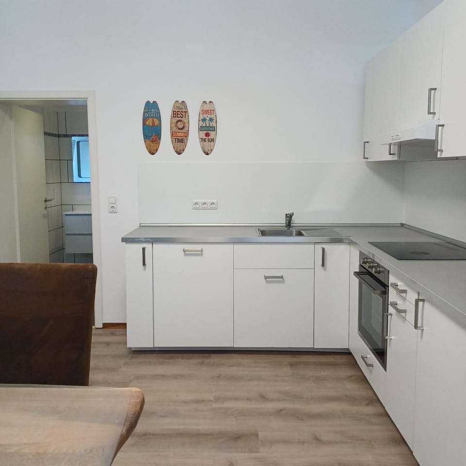 Kitchen or kitchenette, oven, stove