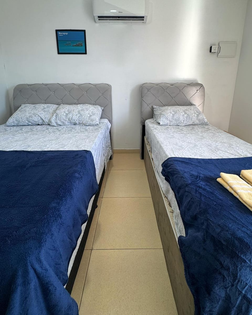 Bed, Photo of the whole room, Bedroom, towels, air conditioner