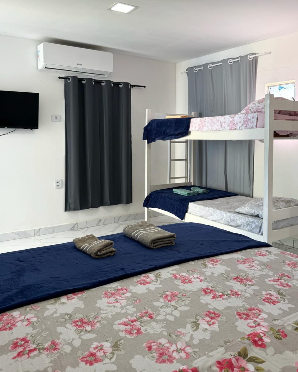 Bed, TV and multimedia, bunk bed, towels, air conditioner