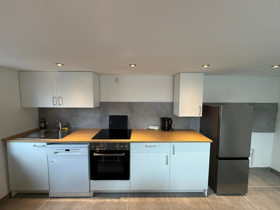 Kitchen or kitchenette, dishwasher, oven, stove, kitchen