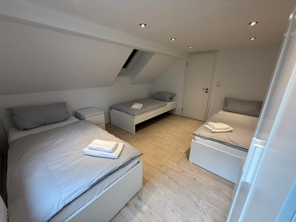 Bed, towels, towels, wardrobe