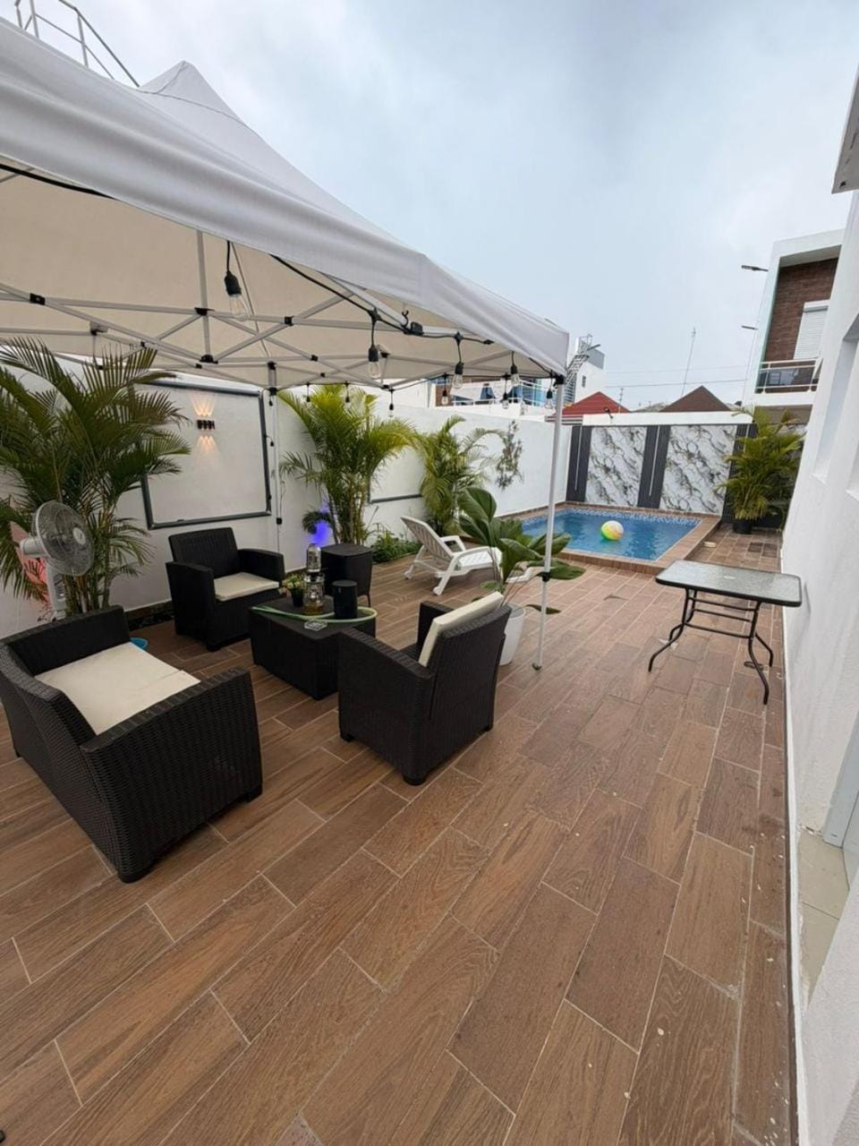 Property building, Patio, Day, View (from property/room), Balcony/Terrace, Living room, Seating area, Pool view, Swimming pool, sunbed