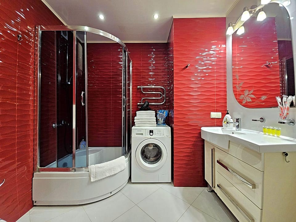Shower, Bathroom, hair dryier, towels, washing machine, dryer