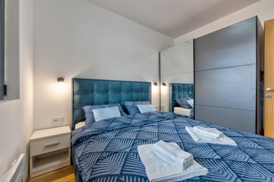 Bed, Photo of the whole room, Bedroom, towels, wardrobe