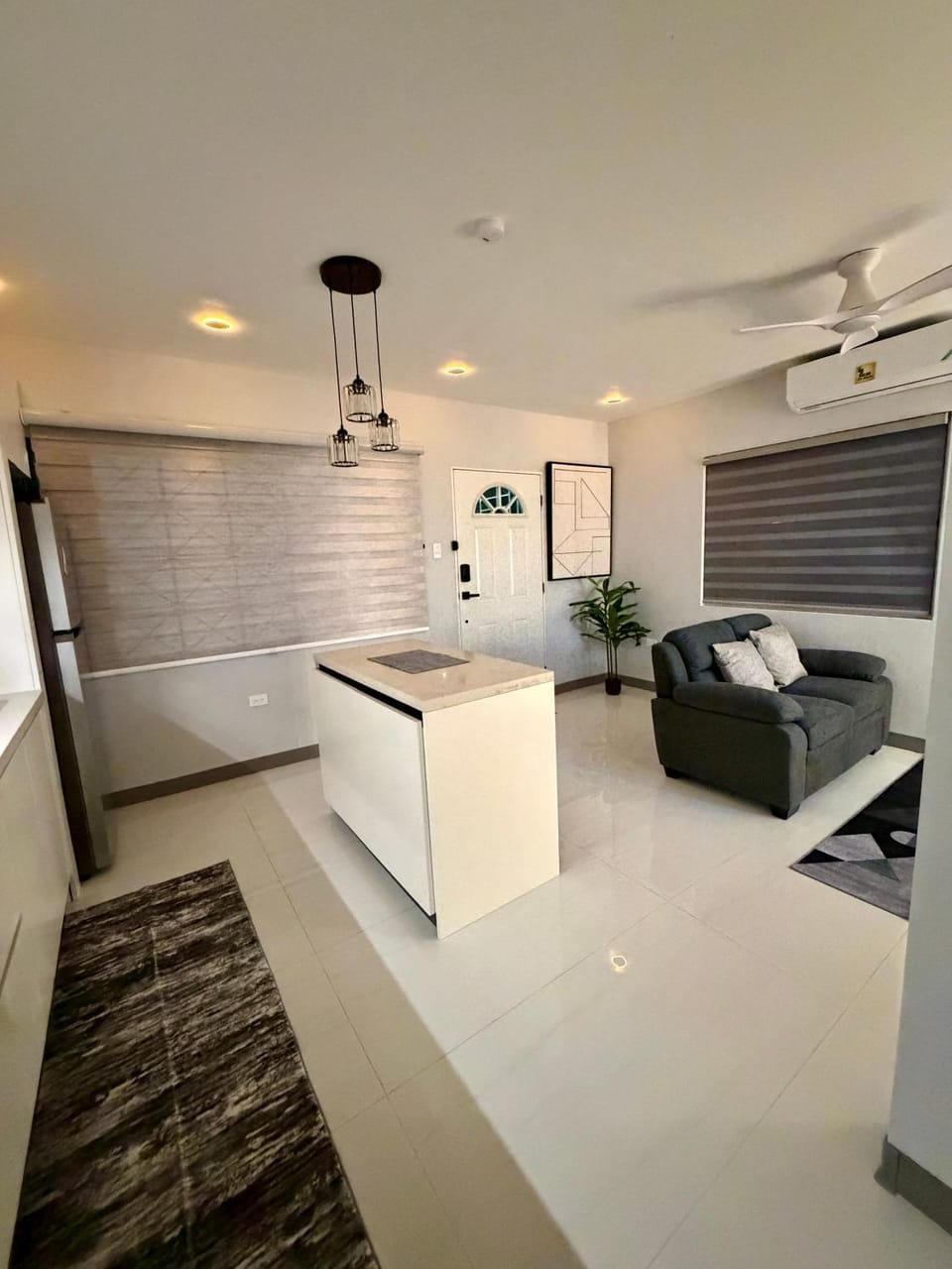Kitchen or kitchenette, Living room, Seating area, stove, air conditioner