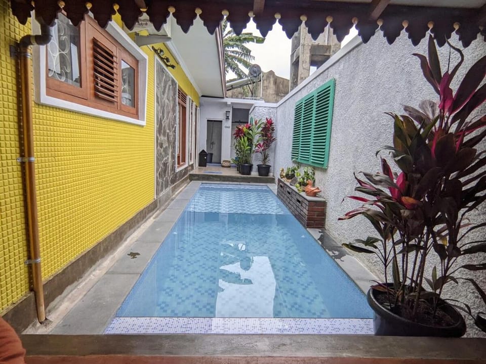 Sabi Red and Yellow House at Prawirotaman Villa in Yogyakarta