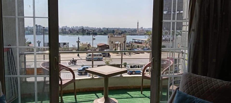 View (from property/room), Balcony/Terrace, Seating area, River view