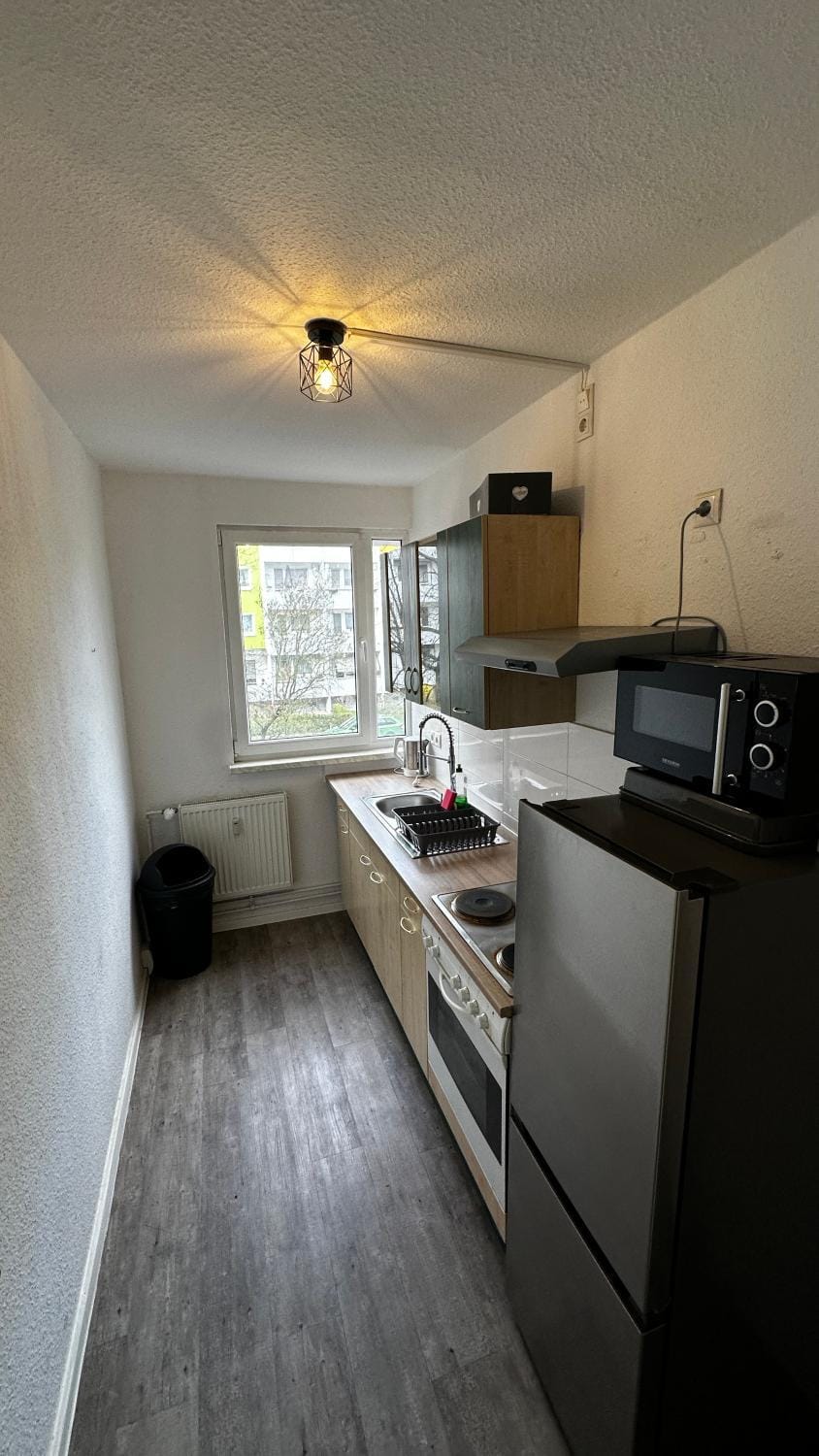 Kitchen or kitchenette, oven, stove