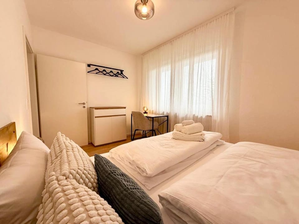 Bed, Photo of the whole room, Seating area, Bedroom, towels, towels, wardrobe